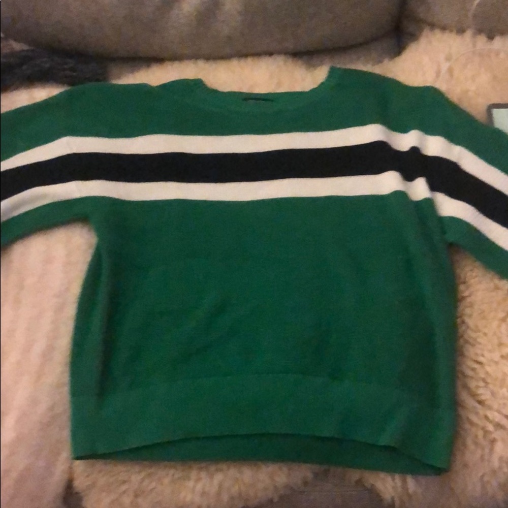 Green crew neck with a black and white stripe